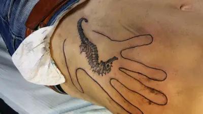 Inky Dragon Tattoo and BodyPiercing